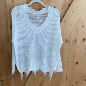 White V-neck sweater